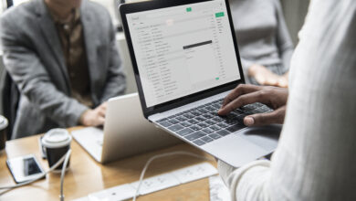 man-checking-his-email-laptop