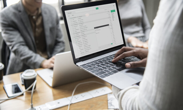 man-checking-his-email-laptop